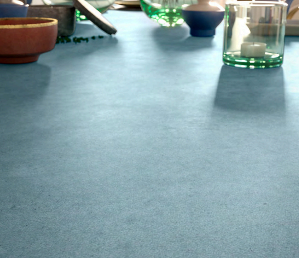 Ứng dụng đá nung kết Terre Ottanio trong mặt bàn bếp và tường phòng khách