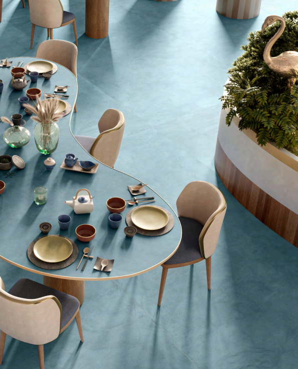 Ứng dụng đá nung kết Terre Ottanio trong mặt bàn bếp và tường phòng khách